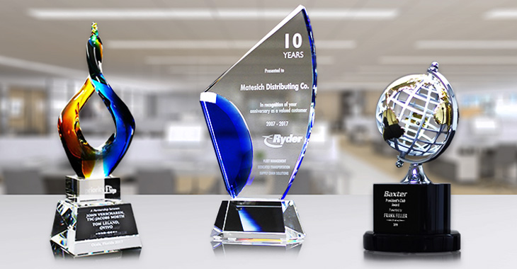 3 EDCO Awards set on a office table