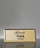 Picture of Imprinted Metal Name Badge With Gold Frame - 3 x 1 Inch