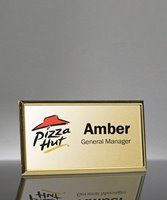 Picture of Imprinted Metal Name Badge With Gold Frame - 3 x 1.5 Inch